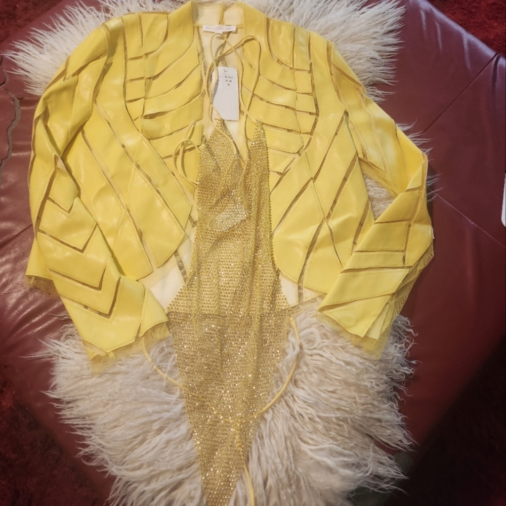 Leather jacket with tied up bodysuits sequence with diamond accents